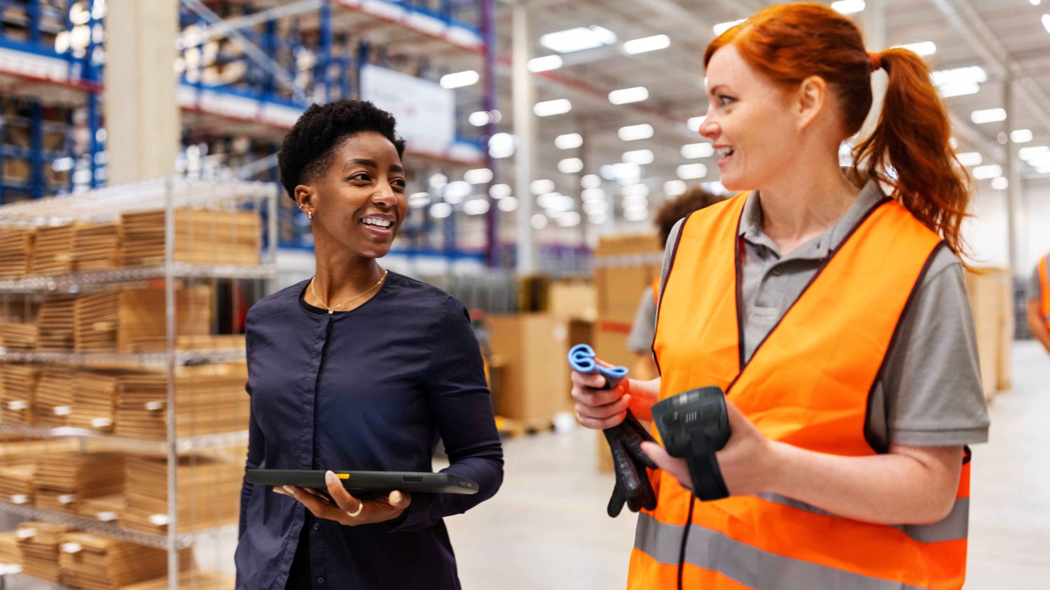 brand-photography-lifestyle-employees-walking-warehouse-16x9-3600x2025