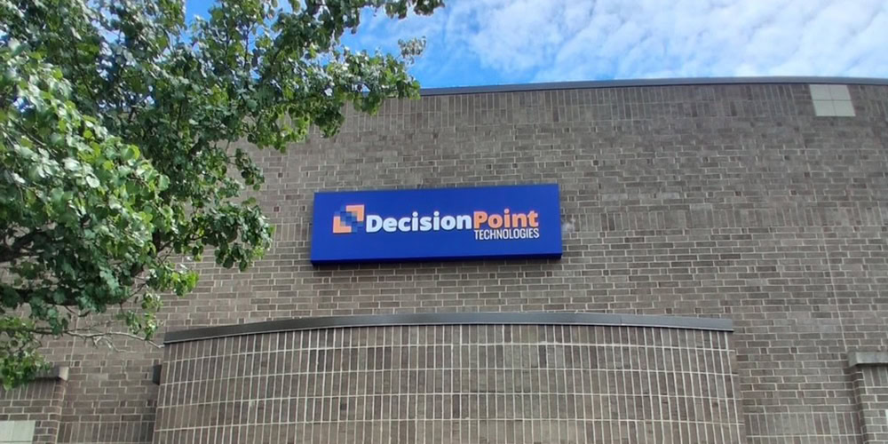 DecisionPoint Technologies Logo on a building.