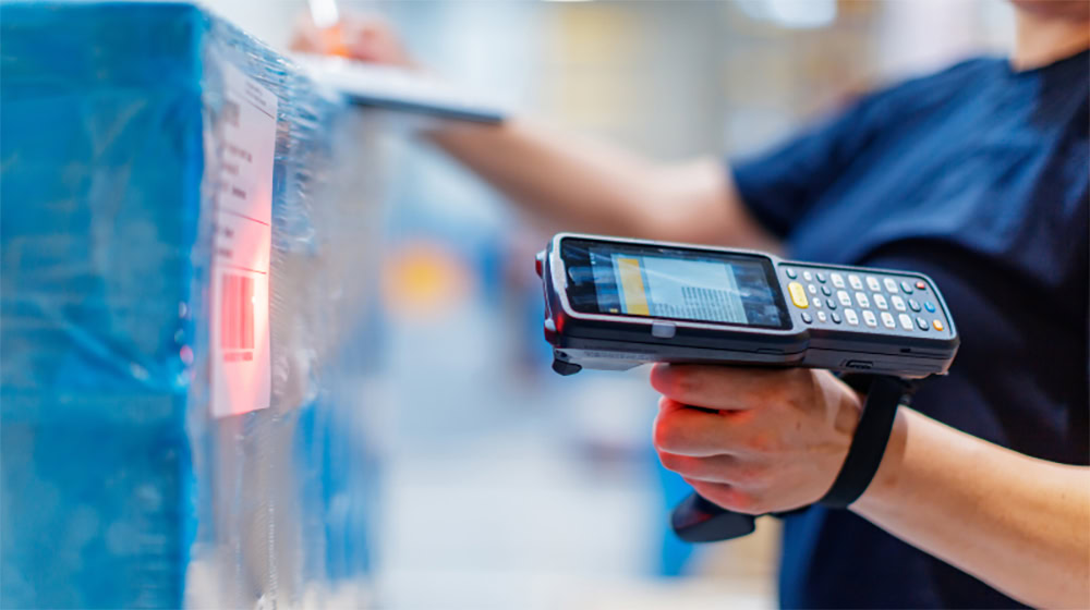 Handheld scanner in use, showing one kind of Barcode Scanner.
