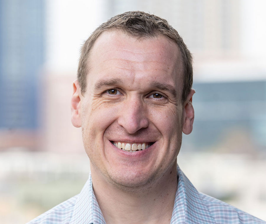 Sean Gillis smiles at the camera.