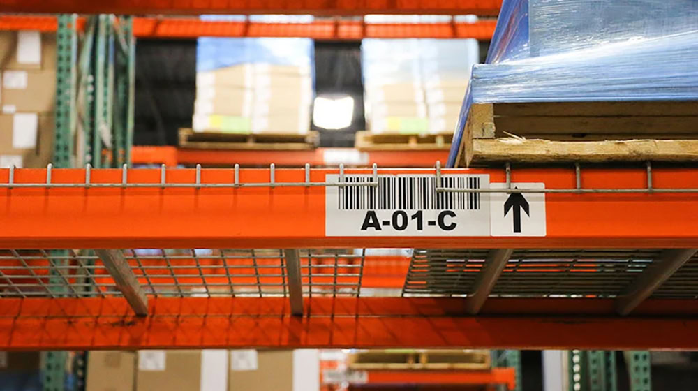 Barcode on a warehouse shelf used for warehouse labeling.