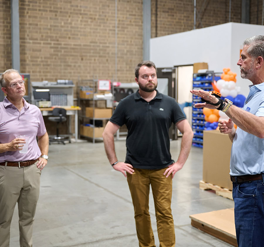 DecisionPoint staff members discuss a wearable deployment.