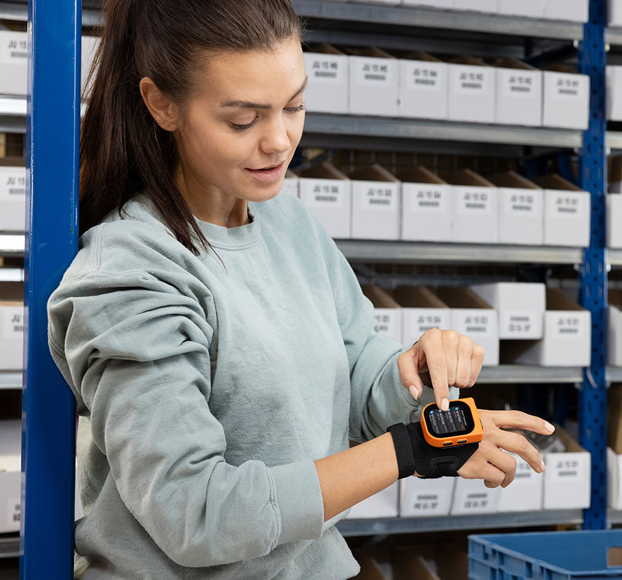 Wearable scanner for inventory showing innovative and necessary hardware and mobile devices available from DecisionPoint.