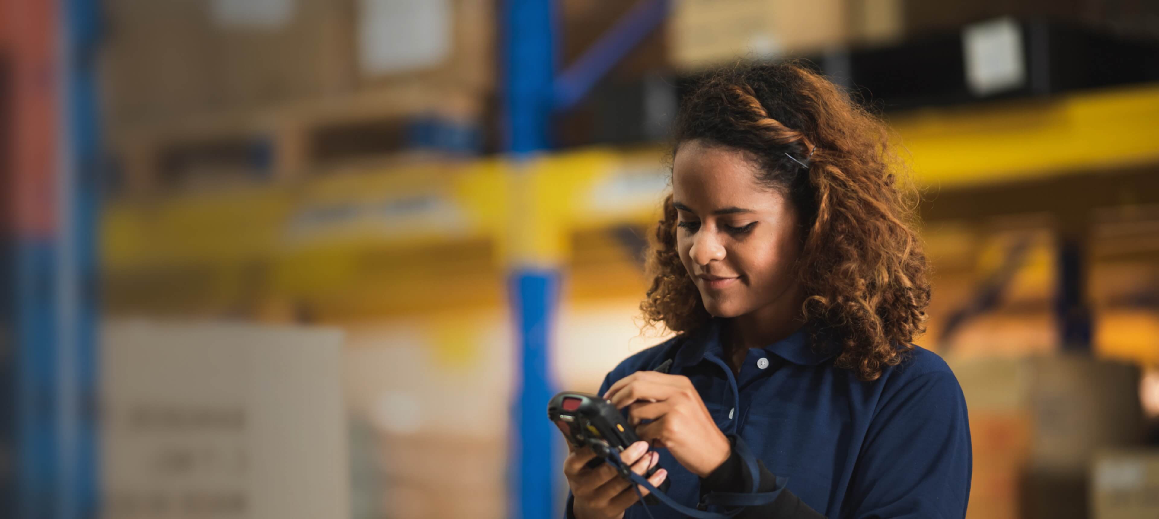 DecisionPoint Technologies employee uses handheld device to create complete end-to-end visibility on the edge.