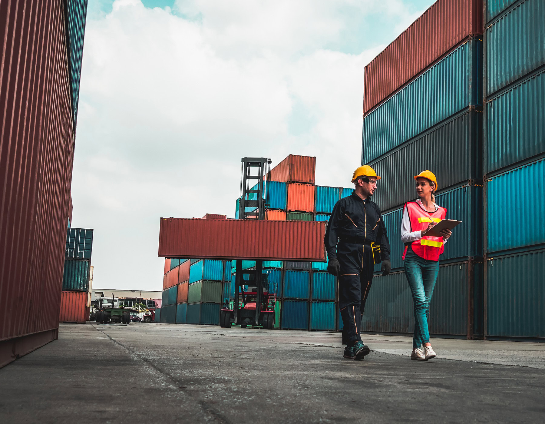 Two employees record information while receiving supplies, keeping full visibility through the chain.