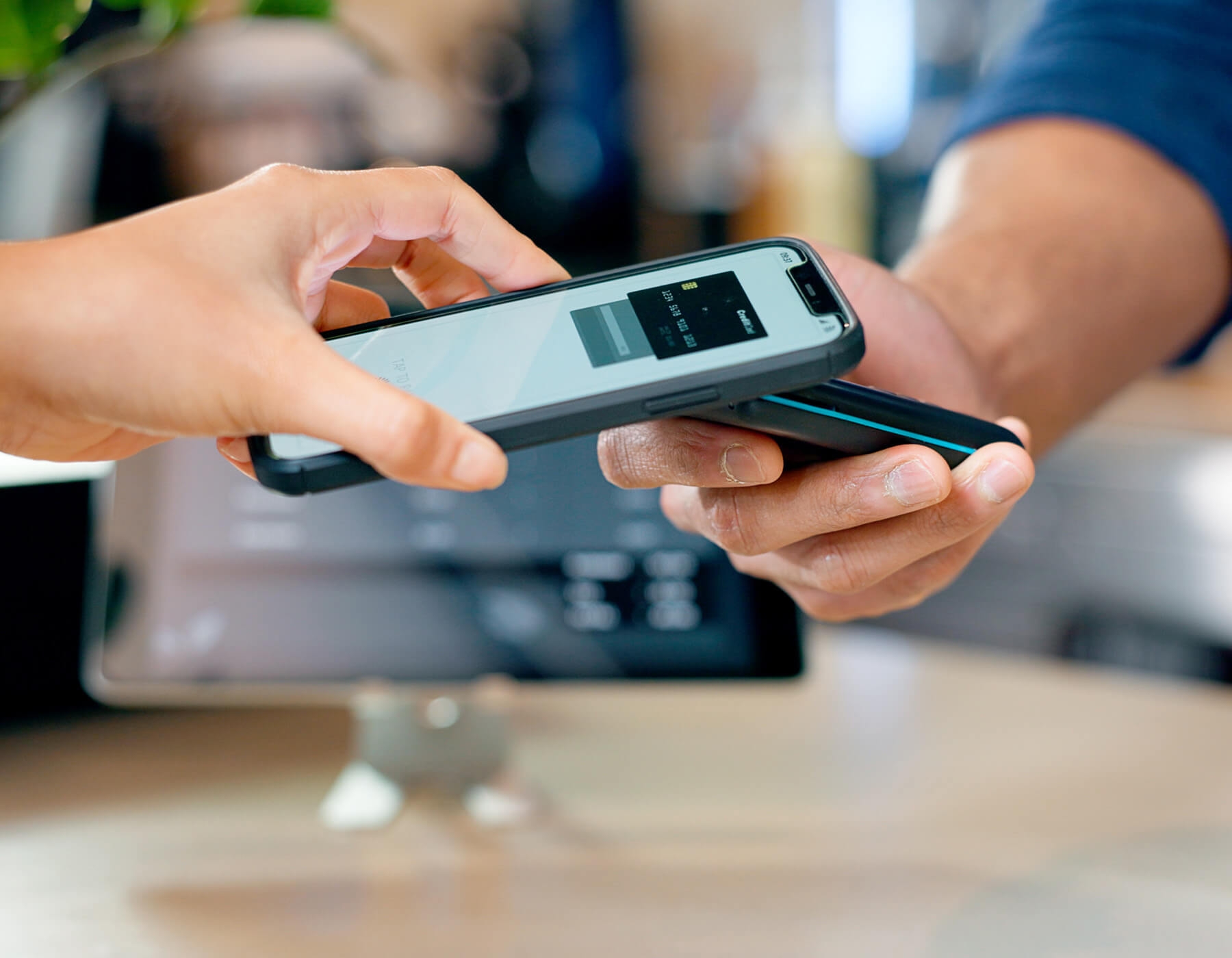 VeriMy software in use by two people, using mobile devices.