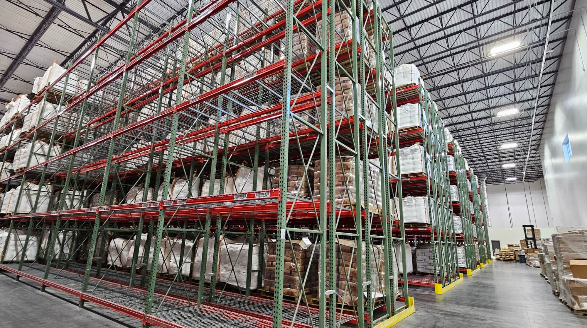 Jillamy racking full of product in a storage warehouse.