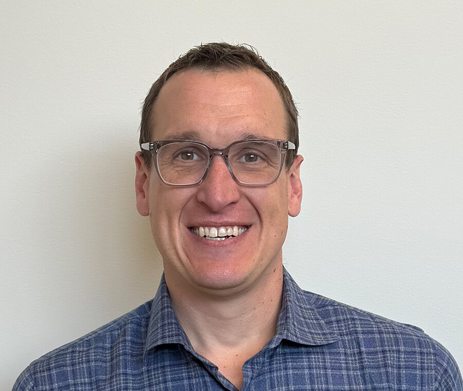 Sean Gillis smiles at the camera.