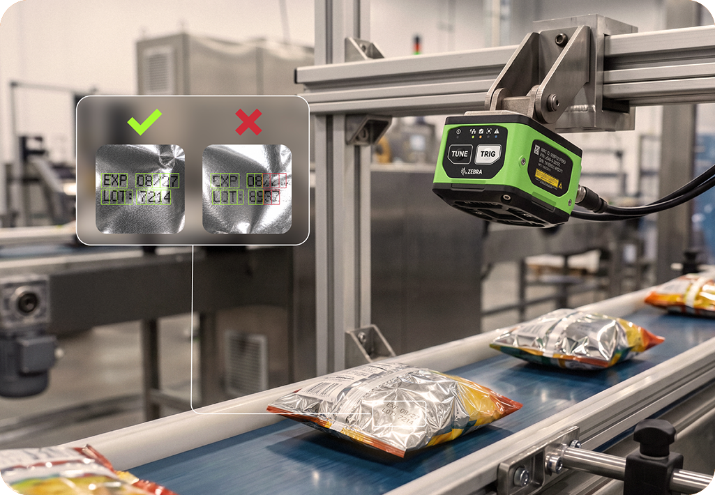 Zebra fixed industrial scanner inspecting packages on a manufacturing conveyor line